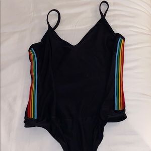 Black bodysuit with rainbows on the side